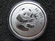 серебряные монеты в капсулах